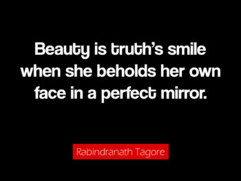 Black background with a quote from rabindranah tagore about beauty.